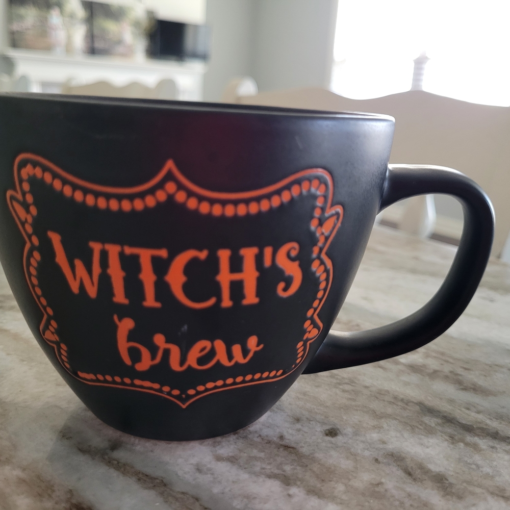 Witch's Brew Black Mug with Orange Design